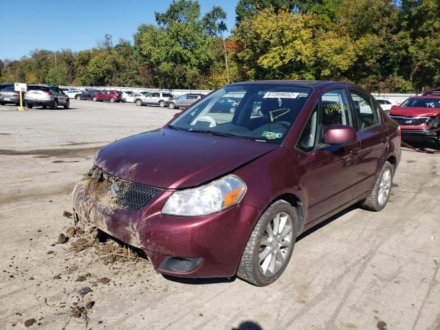 Photo 2 from auction – 2011 SUZUKI SX4 LE with VIN JS2YC5A29B6303064