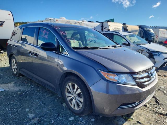 HONDA ODYSSEY SE 2014 with VIN 5FNRL5H38EB505352 - Photo from auction