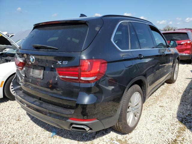 Photo 4 from auction – 2014 BMW X5 XDRIVE5 with VIN 5UXKR6C51E0J71774