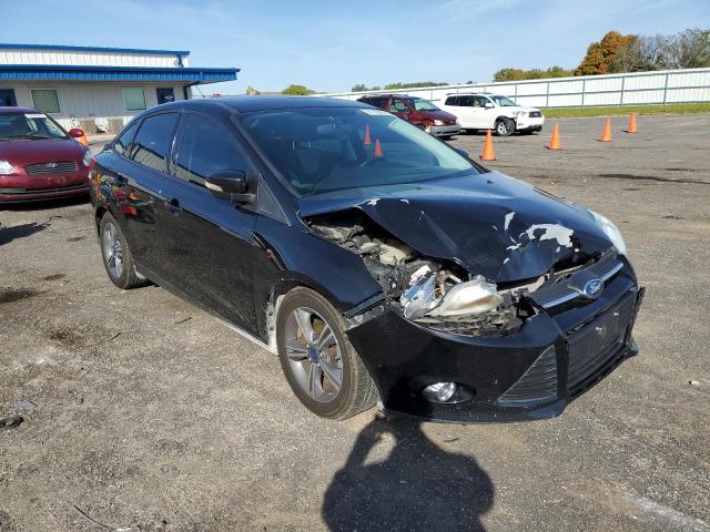 FORD FOCUS SE 2014 with VIN 1FADP3F22EL169360 - Photo from auction