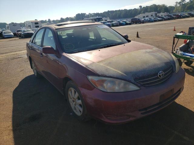TOYOTA CAMRY LE 2002 with VIN 4T1BF32K72U015030 - Photo from auction