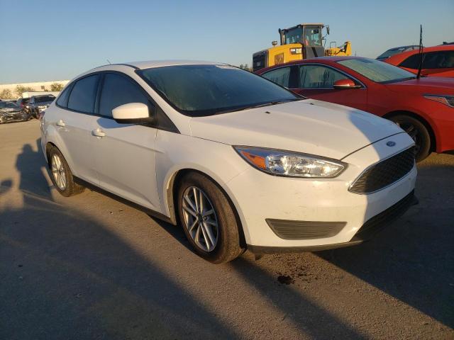 FORD FOCUS SE 2018 with VIN 1FADP3F25JL209389 - Photo from auction