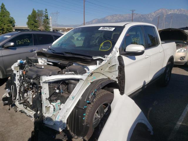 Photo 2 from auction – 2022 HONDA RIDGELINE with VIN 5FPYK3F54NB018034