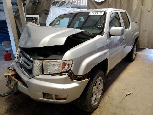Photo 2 from auction – 2010 HONDA RIDGELINE with VIN 5FPYK1F52AB010089