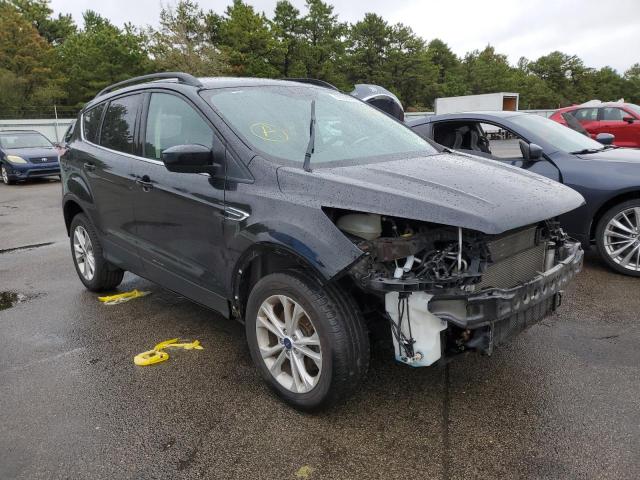 FORD ESCAPE SE 2018 with VIN 1FMCU9GD4JUB15785 - Photo from auction