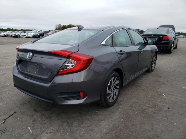 Photo 4 from auction – 2018 HONDA CIVIC EX with VIN 2HGFC2F70JH560388