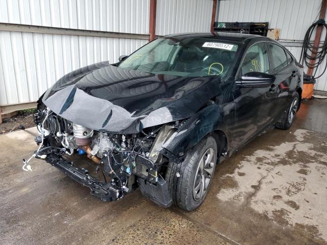 Photo 2 from auction – 2021 HONDA CIVIC LX with VIN 19XFC2F61ME200214