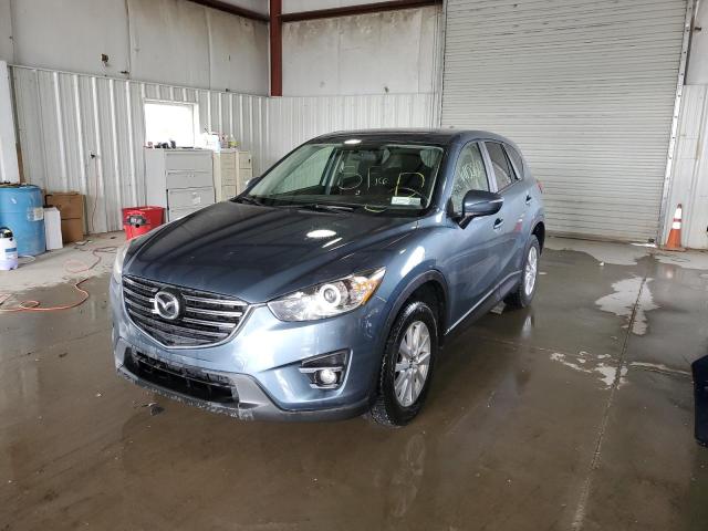 Photo 2 from auction – 2016 MAZDA CX-5 TOURI with VIN JM3KE2CY8G0690489