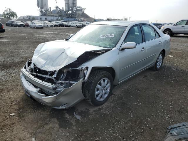 Photo 2 from auction – 2003 TOYOTA CAMRY LE with VIN JTDBE32K230158581