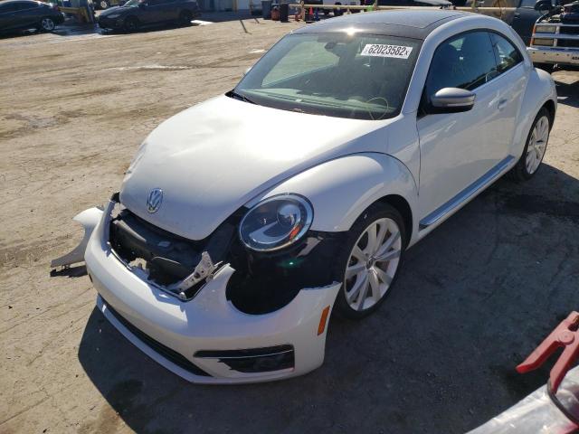 Photo 2 from auction – 2014 VOLKSWAGEN BEETLE with VIN 3VWJL7AT5EM653311