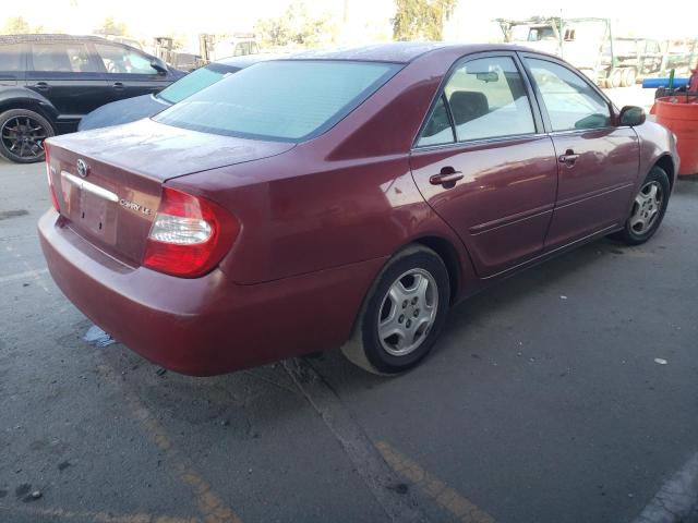 Photo 4 from auction – 2002 TOYOTA CAMRY LE with VIN JTDBE32K520043813