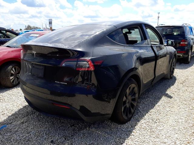 Photo 4 from auction – 2021 TESLA MODEL Y with VIN 5YJYGDEE0MF070454