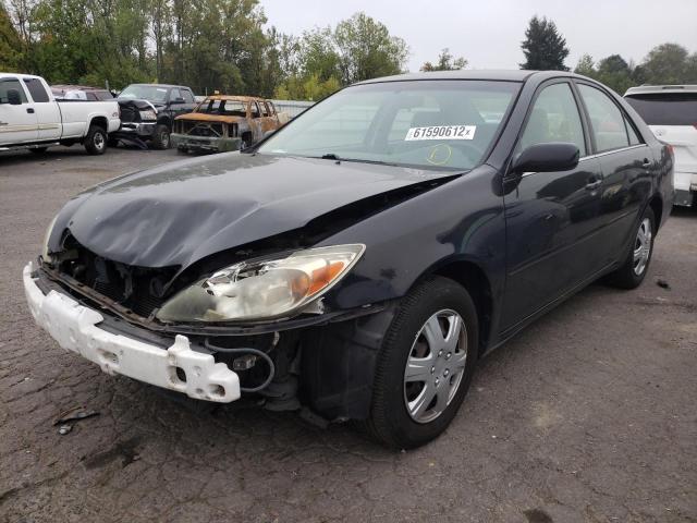Photo 2 from auction – 2002 TOYOTA CAMRY LE with VIN JTDBE32K720010764
