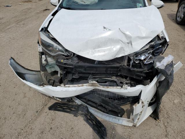 Photo 9 from auction – 2014 TOYOTA COROLLA L with VIN 5YFBURHE3EP007698