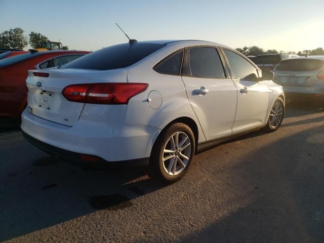 Photo 4 from auction – 2018 FORD FOCUS SE with VIN 1FADP3F25JL209389