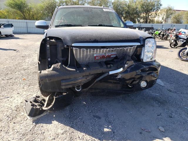 Photo 9 from auction – 2011 GMC YUKON SLT with VIN 1GKS1CE01BR212957