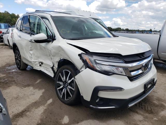 HONDA PILOT TOUR 2019 with VIN 5FNYF6H60KB036952 - Photo from auction
