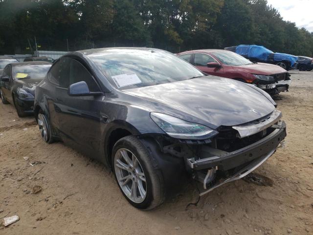 TESLA MODEL Y 2021 with VIN 5YJYGDEE4MF145169 - Photo from auction