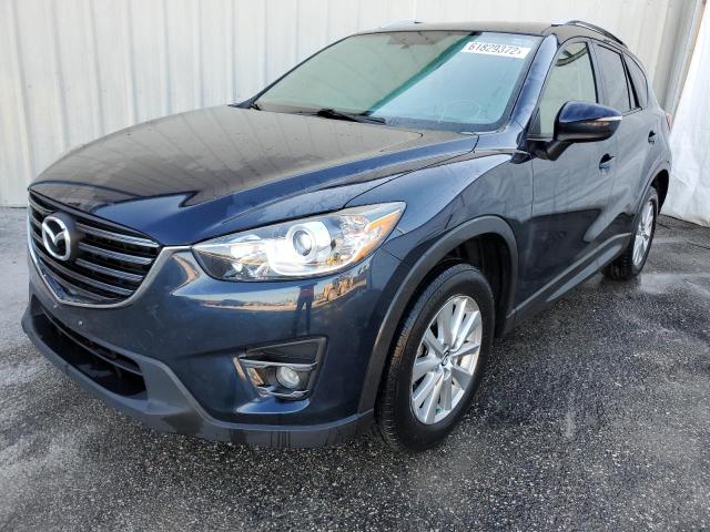 Photo 2 from auction – 2016 MAZDA CX-5 TOURI with VIN JM3KE2CY8G0887985