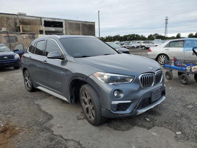 BMW X1 XDRIVE2 2017 with VIN WBXHT3C33H5F82715 - Photo from auction