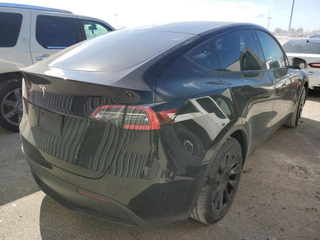 Photo 4 from auction – 2021 TESLA MODEL Y with VIN 5YJYGDED2MF121024