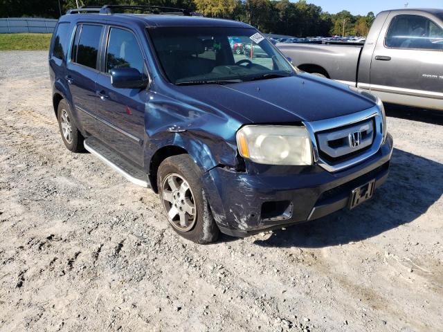HONDA PILOT TOUR 2011 with VIN 5FNYF4H97BB068389 - Photo from auction