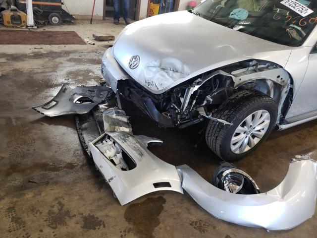 Photo 9 from auction – 2013 VOLKSWAGEN BEETLE with VIN 3VWFP7ATXDM631605