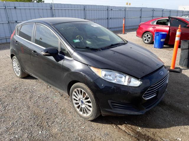 FORD FIESTA TIT 2014 with VIN 3FADP4FJ9EM190301 - Photo from auction