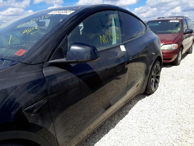 Photo 9 from auction – 2021 TESLA MODEL Y with VIN 5YJYGDEE0MF070454