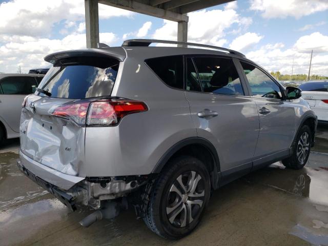 Photo 4 from auction – 2018 TOYOTA RAV4 LE with VIN 2T3ZFREV4JW519693