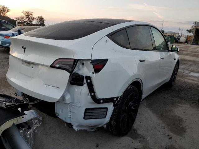 Photo 4 from auction – 2021 TESLA MODEL Y with VIN 5YJYGDEE1MF103431