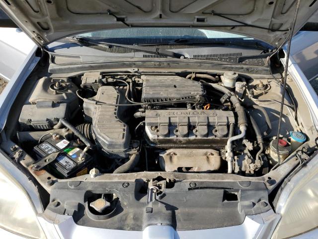 Photo 7 from auction – 2003 HONDA CIVIC LX with VIN 1HGEM21543L002323
