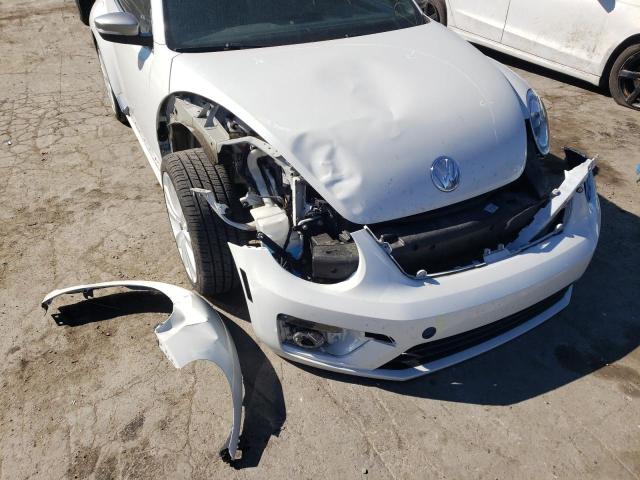Photo 9 from auction – 2014 VOLKSWAGEN BEETLE with VIN 3VWJL7AT5EM653311