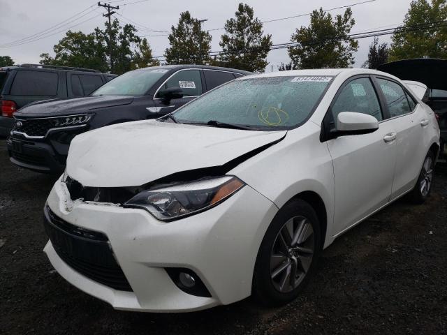 Photo 2 from auction – 2014 TOYOTA COROLLA EC with VIN 5YFBPRHE3EP008230