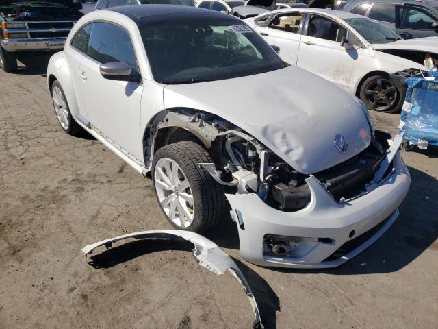 VOLKSWAGEN BEETLE 2014 with VIN 3VWJL7AT5EM653311 - Photo from auction