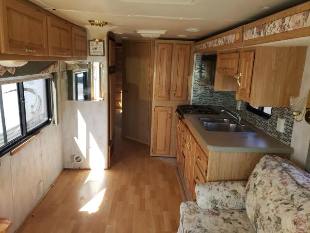 Photo 6 from auction – 2000 FORD VACATIONER with VIN 1FCNF53S5Y0A00974