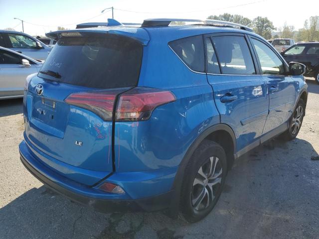 Photo 4 from auction – 2017 TOYOTA RAV4 LE with VIN JTMZFREV0HJ706888