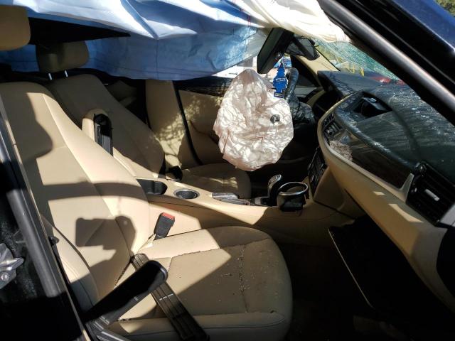 Photo 5 from auction – 2015 BMW X1 SDRIVE2 with VIN WBAVM1C57FVW57796