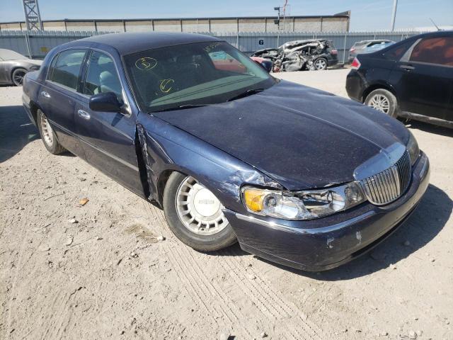Zdjęcie 1 z aukcji – 2002 LINCOLN TOWN CAR E z VIN 1LNHM81W52Y642898