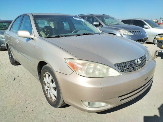 TOYOTA CAMRY 2003 with VIN 4T1BF30K93U563292 - Photo from auction