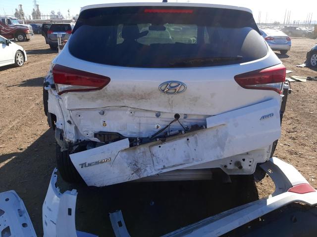 Photo 9 from auction – 2018 HYUNDAI TUCSON SE with VIN KM8J2CA46JU777550