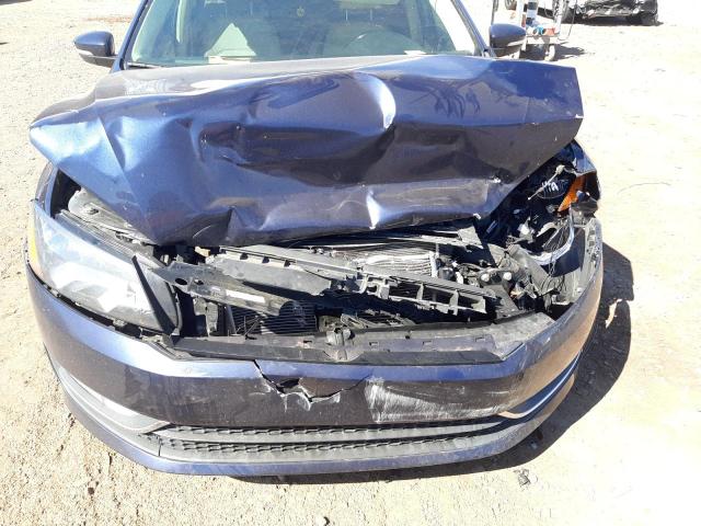 Photo 9 from auction – 2015 VOLKSWAGEN PASSAT S with VIN 1VWAT7A35FC108518