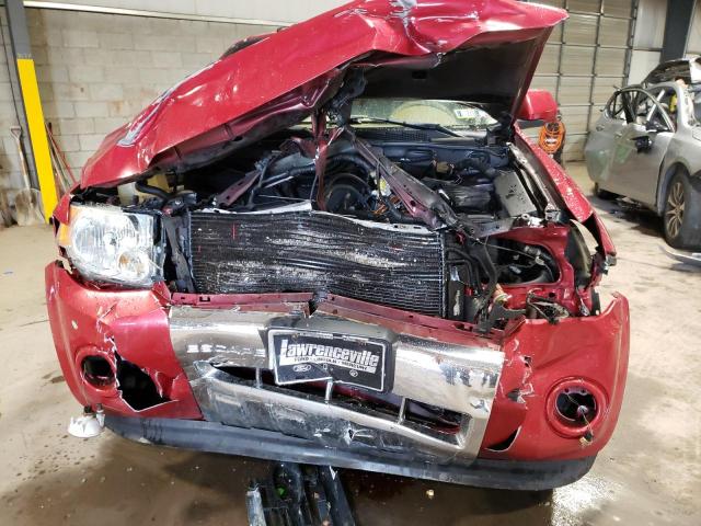 Photo 9 from auction – 2009 FORD ESCAPE LIM with VIN 1FMCU04799KB34477