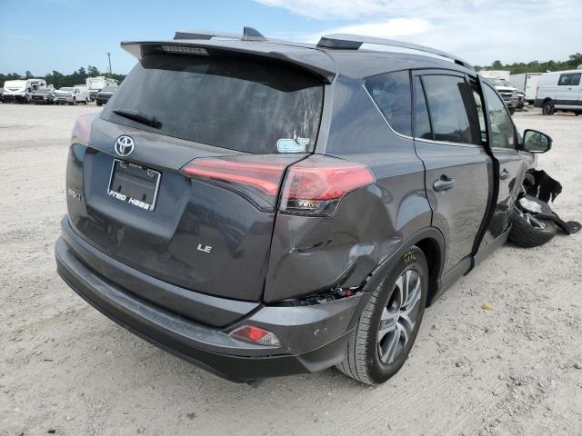 Photo 4 from auction – 2018 TOYOTA RAV4 LE with VIN JTMZFREV2JJ184397
