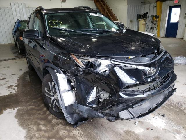 TOYOTA RAV4 LE 2018 with VIN 2T3BFREV2JW754854 - Photo from auction