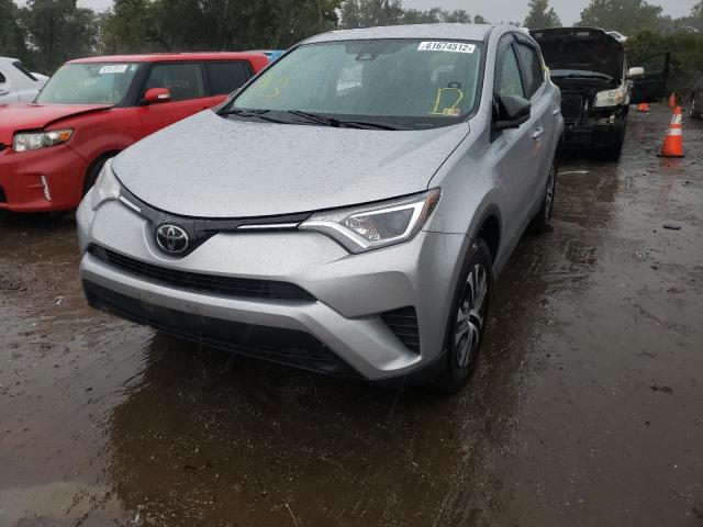 Photo 2 from auction – 2018 TOYOTA RAV4 LE with VIN 2T3ZFREV1JW502236