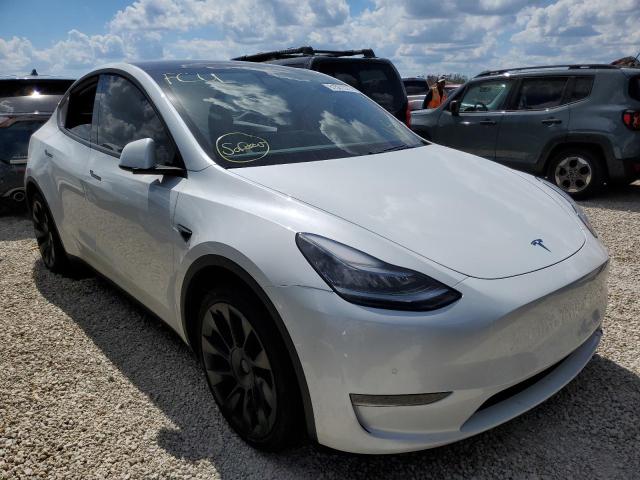 TESLA MODEL Y 2021 with VIN 5YJYGDEE4MF087712 - Photo from auction