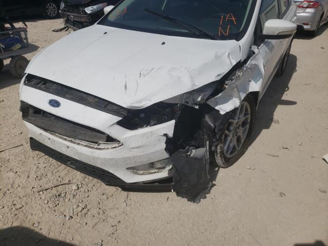 Photo 9 from auction – 2015 FORD FOCUS SE with VIN 1FADP3F28FL218482