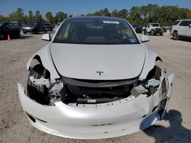 Photo 9 from auction – 2022 TESLA MODEL 3 with VIN 5YJ3E1EA1NF205664