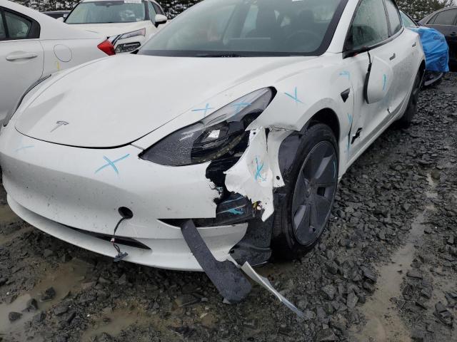 Photo 9 from auction – 2022 TESLA MODEL 3 with VIN 5YJ3E1EB7NF208111
